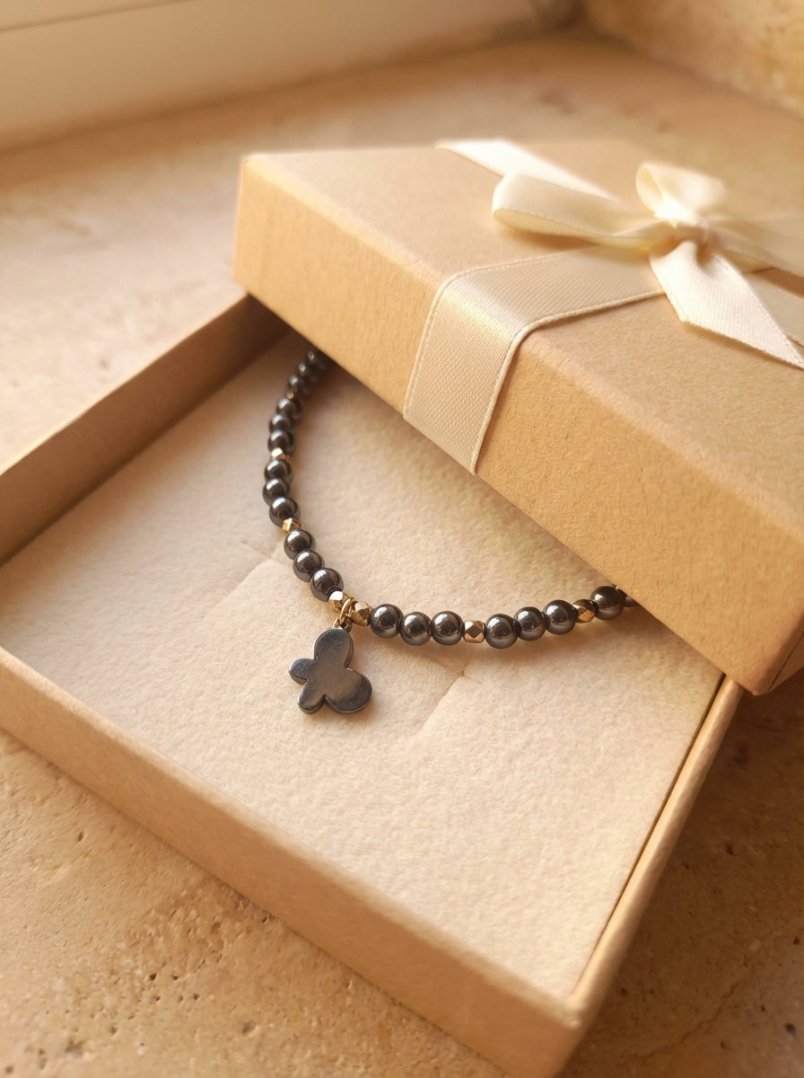 Hematite Bead Necklace with Gold-Tone Clover Charm