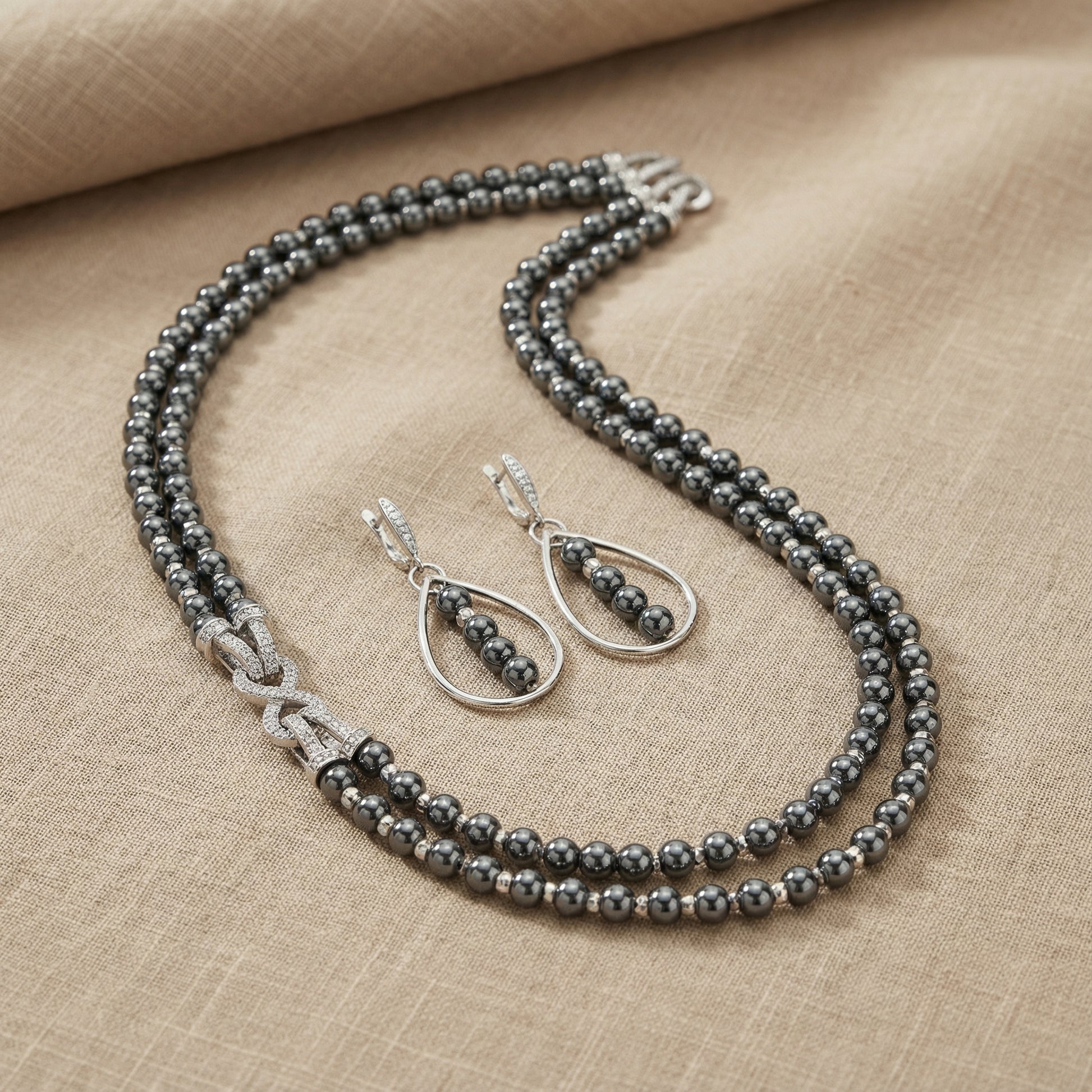 Midnight Hematite necklace set flat lay