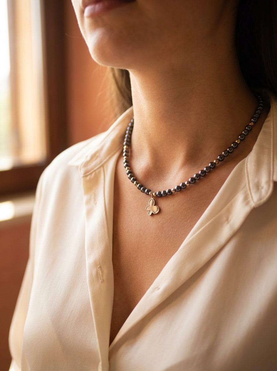 Hematite Bead Necklace with Gold-Tone Clover Charm