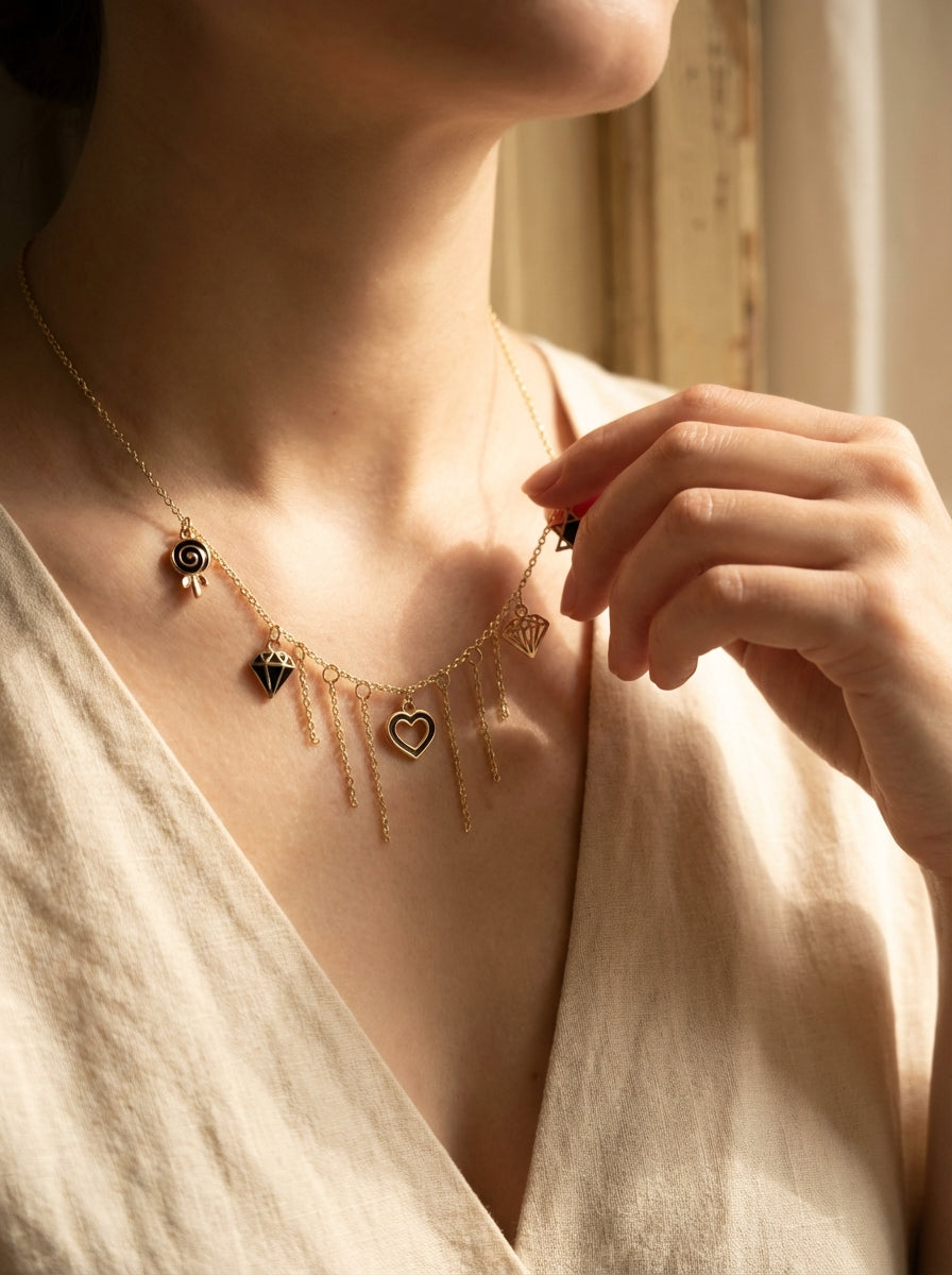 Gold-Plated Charm Necklace with Cascading Chains & Mixed Symbols