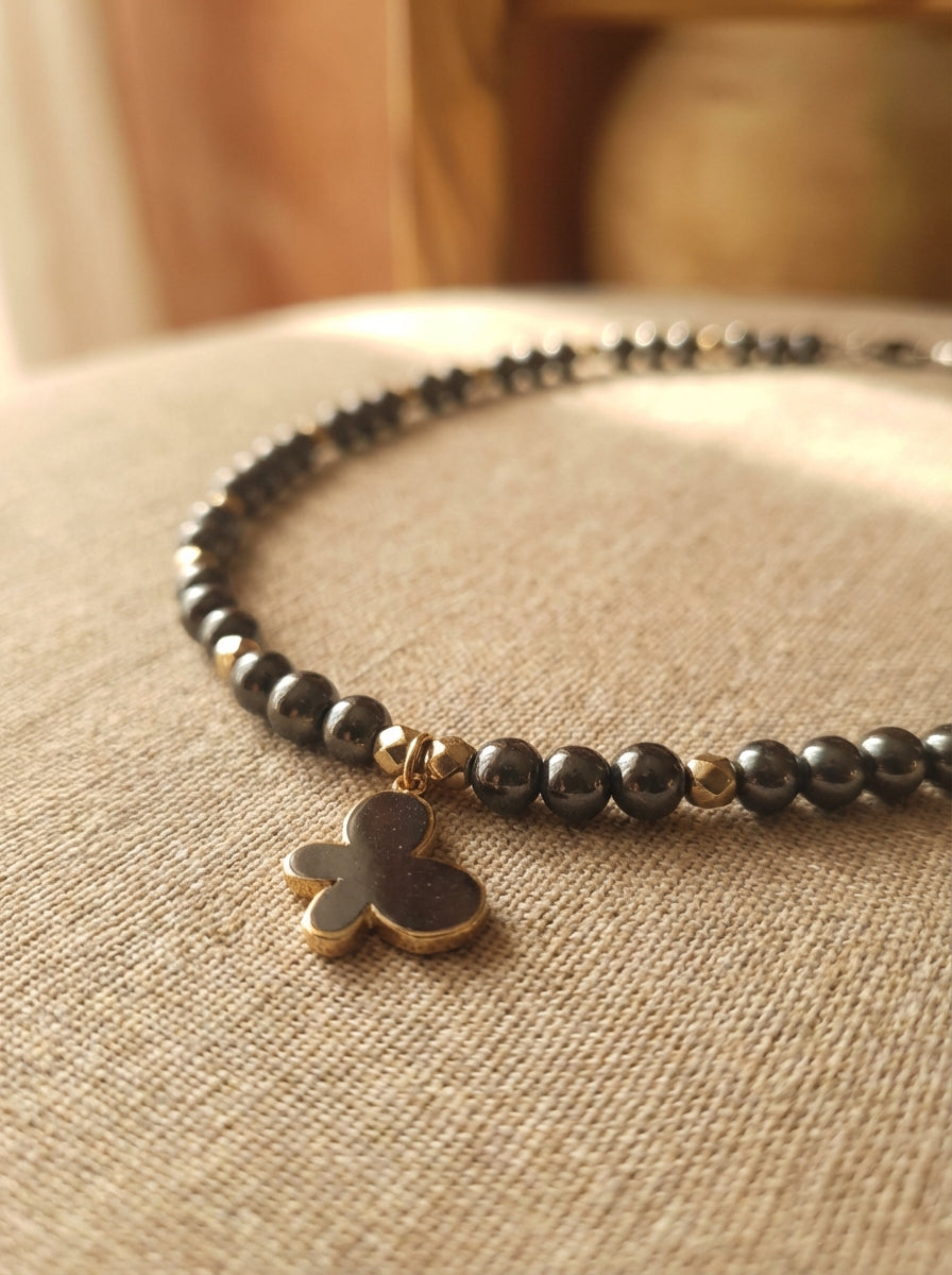 Hematite Bead Necklace with Gold-Tone Clover Charm